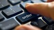 © Space Priest - A person is typing on a keyboard and pressing the order key
