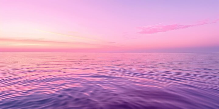 Beautiful ocean with a pink and blue sky background