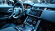 © Atchariya63 - Modern car interior with leather seats, steering wheel and dashboard.