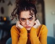 © wpw - A woman has a stressed expression on her face. Her face showed signs of emotional exhaustion.