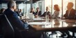 © STUDIO.no.3 - Business concept. Business meeting in boardroom. Blurred people on background. Team meeting in office near table.