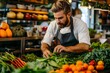 © Rebecca J - Chef in a restaurant preparing farm fresh vegetables. Wearing an apron.