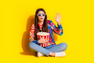 Sticker - Full body photo of attractive teen watch horror movie scared dressed stylish colorful clothes isolated on yellow color background