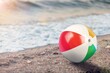 © BillionPhotos.com - Colorful air beach ball toy