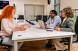 © Mediteraneo - Human resource team talking to a candidate during a job interview in the office.