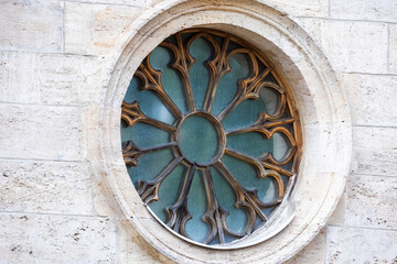 Sticker - Round Gothic window with wooden frame in stone wall