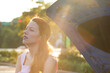 © pathdoc - broken car on a road. Side view of a young stressed woman driver