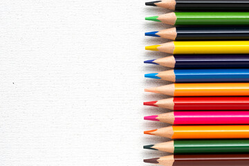 Set of colored pencils white background.