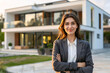 © Di Studio - portrait of successful female real estate agent near modern house