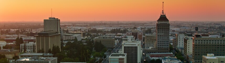 Wall Mural - 4K Ultra HD Drone Shot of Morning Sunlight on Downtown Buildings in Fresno, California