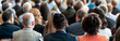 © Наталья Лазарева - Employees attending a corporate training seminar in workshop auditorium,participating in educational lecture,for use in presentations,corporate training manuals,team-building events,view from back