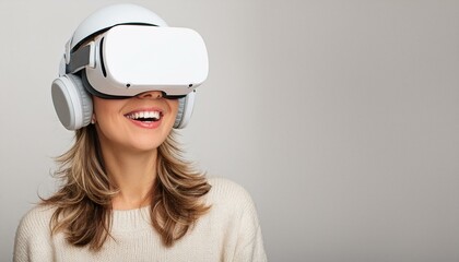 Portrait of happy woman wearing virtual reality glasses isolated on flat white background with copy space. Banner template of smiling woman in white VR goggles