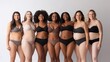 © Daria Lukoiko - Despite their differences, these women are united in their celebration of body positivity and self-acceptance. Multicultural group of happy girls of different races with imperfect bodies in lingerie