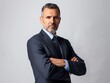 © Korn - Business Senior Manager, Confident Executive arms crossed, Businessman studio shot, formal business happy smiling