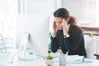 © peopleimages.com - Businesswoman, computer and headache pain or stress migraine with burnout, fatigue or overtime. Female person, desk and mental health brain fog with tension pressure or frustrated, tired or deadline