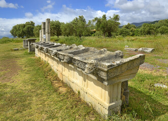 Wall Mural - Waterspouts in the form of lion heads, doric style - The archaeological site of Ancient Messene, Peloponnese, Greece. Ancient Messene was founded in 369 BC. UNESCO World Heritage Site tentative list