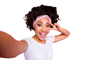 Wall Mural - Self-portrait of her she nice-looking charming cute winsome adorable magnificent attractive lovely cheerful cheery crazy wavy-haired girl showing v-sign having fun isolated over pink pastel background