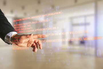 Wall Mural - multi exposure of businessman hand clicks on abstract graphic coding sketch on blurred office backgr
