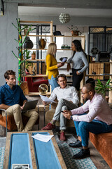 Poster - Business team having an informal meeting in loft office