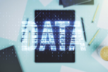 Wall Mural - creative data word sign and modern digital tablet on background, top view. multiexposure