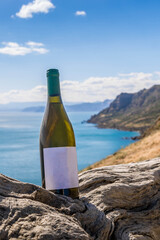 Poster - Bottle of wine by the sea