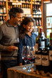 © AI_images - a Hispanic family operating a boutique wine shop, offering tastings and sharing stories behind each wine