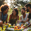 © imountain - group of LGBTQIA  friends enjoying a picnic in the park