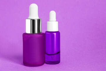 Poster - Serum bottles on purple