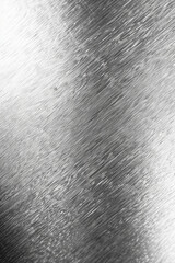 Wall Mural - close-up of brushed metal texture with visible grain and shiny surface. industrial, modern, and abst