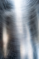 Wall Mural - close-up image of a metal surface with light scratches, showing texture and details. perfect for bac