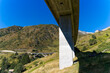 © Michael Derrer Fuchs - Scenic view of viaduct of mountain pass road at Swiss Gotthard Pass in the alps on a sunny late summer day. Photo taken September 10th, 2023, Gotthard, Switzerland.