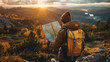 © Александр Марченко - Hiker reading a map at sunrise