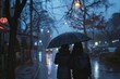 © GHArtwork - a couple walking together sharing an umbrella together on a rainy day