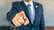 © Ilja - Motivated businessman points directly at viewer, leadership and encouragement concept
