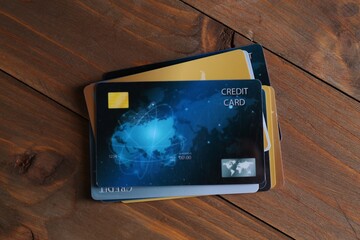 Canvas Print - Many credit cards on wooden table, top view