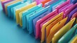 © Malika - Organized file folders in vibrant colors on a shelf