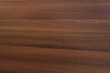 © Maciej - Closeup of natural wood flooring with a warm, beige and peach tint. The planks show a beautiful pattern and have a glossy varnish finish.