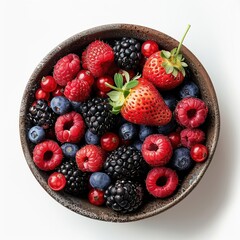 Canvas Print - A bowl of juicy and fresh mixed berries top view isolated on a white background