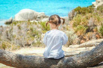 Sticker - happy child playing by the sea