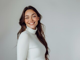 Wall Mural - Stylish young brunette woman smiling on a white background. Beauty and fashion. Style.
