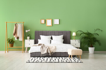 Wall Mural - Comfortable bed, pillows and bedside tables in stylish bedroom
