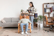 © Pixel-Shot - Female psychologist with notebook and hypnotized man in office