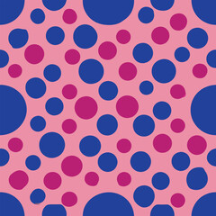 Wall Mural - seamless vector pattern with blue and magenta polka dots on pink background