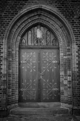 the wooden door of old church