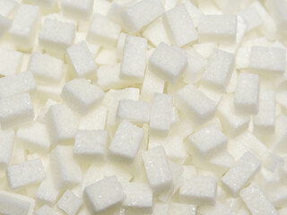 Sticker - white sugar cubes on a black background