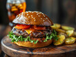© lam - a burger and a refreshing drink. The burger, with its golden-brown bun, is generously filled with a juicy patty, crisp lettuce, and ripe tomato slices. It rests on a wooden cutting