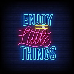 Wall Mural - enjoy the little things neon Sign on brick wall background vector