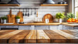© Artanto - Empty Beautiful wood table top and blurred modern kitchen interior background in clean and bright, Ready for product montage