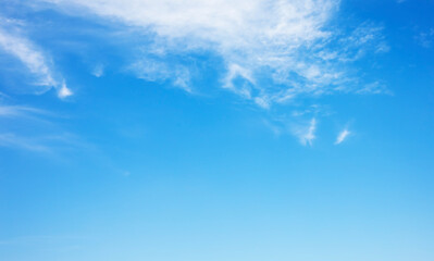 Wall Mural - fantastic soft white clouds against blue sky and copy space horizontal shape. web banner.website hea