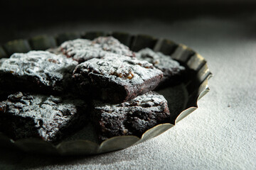 Sticker - Chocolate brownies on a dark background